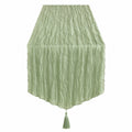 Chemin de table plissé vert sauge avec pompon